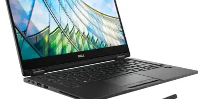 Dell laptop with stylus on a white background, showcasing a sleek design.
