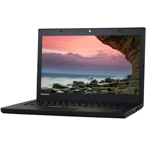 Lenovo laptop displaying a scenic beach sunset on the screen.